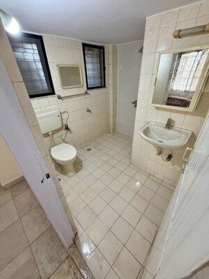 Bathroom in 2 BHK Apartment at Siddha Sky, Sion – for Rent