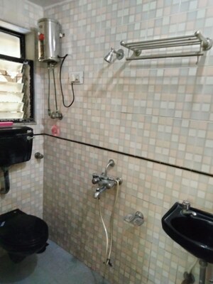 Bathroom in 1 BHK Apartment at Aditya Eksar Kavita CHS LTD, Borivali West – for Rent