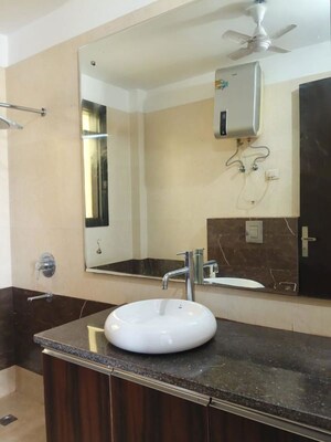 Bathroom in 4 BHK Builder Floor at Greater Kailash I – for Rent