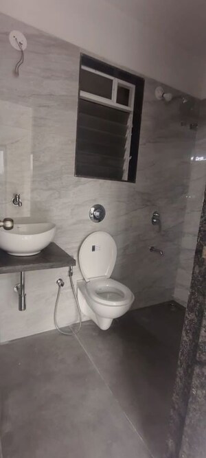 Bathroom in 2 BHK Apartment at Anant Metropolis Insignia Towers, Kasarvadavali – for Rent