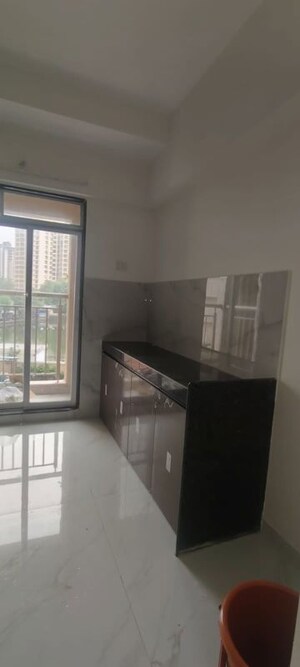 Kitchen in 2 BHK Apartment at Anant Metropolis Insignia Towers, Kasarvadavali – for Rent