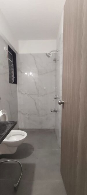 Bathroom in 2 BHK Apartment at Anant Metropolis Insignia Towers, Kasarvadavali – for Rent