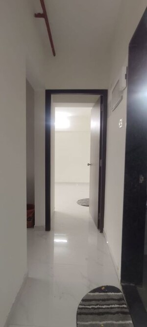 Building Lobby in 2 BHK Apartment at Anant Metropolis Insignia Towers, Kasarvadavali – for Rent