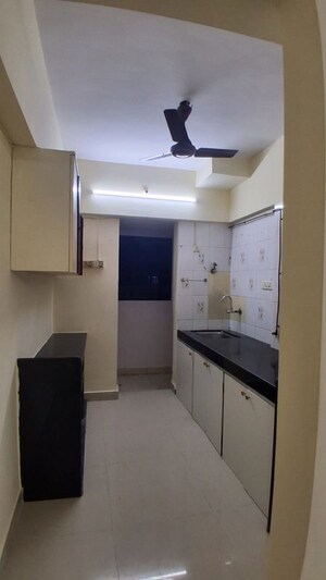 Kitchen in 2 BHK Apartment at Dhruv Heights, Malad East – for Rent