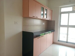 Kitchen in 3 BHK Apartment at Godrej Emerald, Ghodbunder Road – for Rent