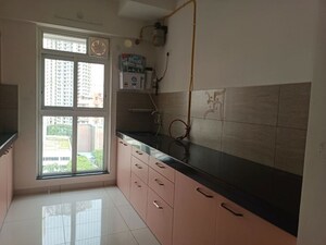 Kitchen in 3 BHK Apartment at Godrej Emerald, Ghodbunder Road – for Rent