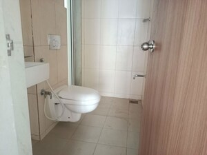 Bathroom in 3 BHK Apartment at Godrej Emerald, Ghodbunder Road – for Rent