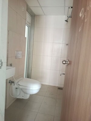 Bathroom in 3 BHK Apartment at Godrej Emerald, Ghodbunder Road – for Rent