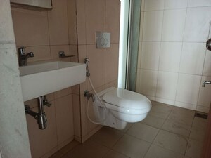 Bathroom in 3 BHK Apartment at Godrej Emerald, Ghodbunder Road – for Rent