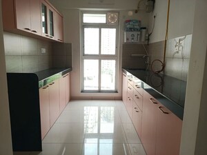 Kitchen in 3 BHK Apartment at Godrej Emerald, Ghodbunder Road – for Rent