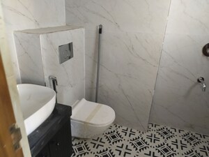Bathroom in 3 BHK Apartment at Malwa Escon Primera, International Airport Road – for Rent