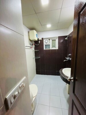 Bathroom in 3 BHK Apartment at Rohtas Presidential Tower, Vibhuti Khand – for Rent