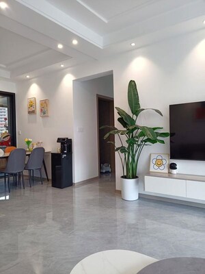 Living Room in 2.5 BHK Apartment at Nimbus The Golden Palm, Sector 168 – for Sale