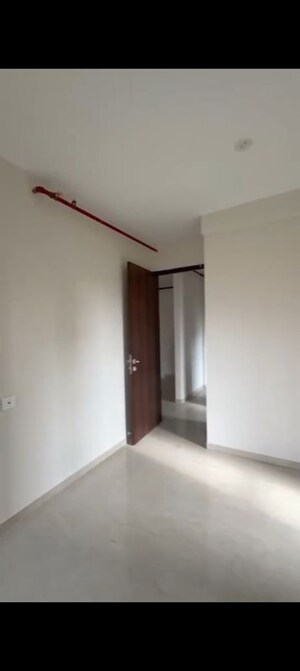 Room in 2 BHK Apartment at Transcon Triumph Tower, Andheri West – for Rent
