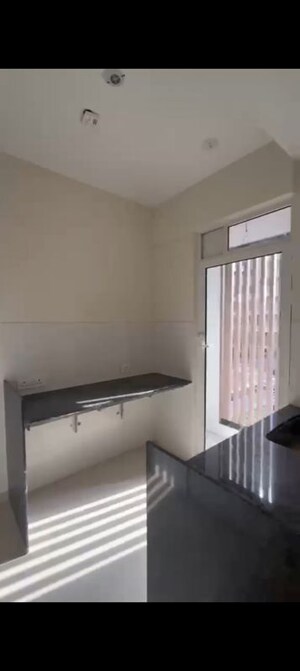 Kitchen in 2 BHK Apartment at Transcon Triumph Tower, Andheri West – for Rent