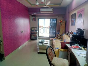 Living Room in 1 BHK Apartment at Seawoods – for Sale