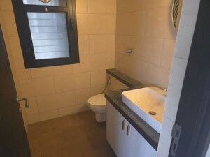 Bathroom in 4 BHK Builder Floor at Ansal API Esencia, Sector 67 – for Sale