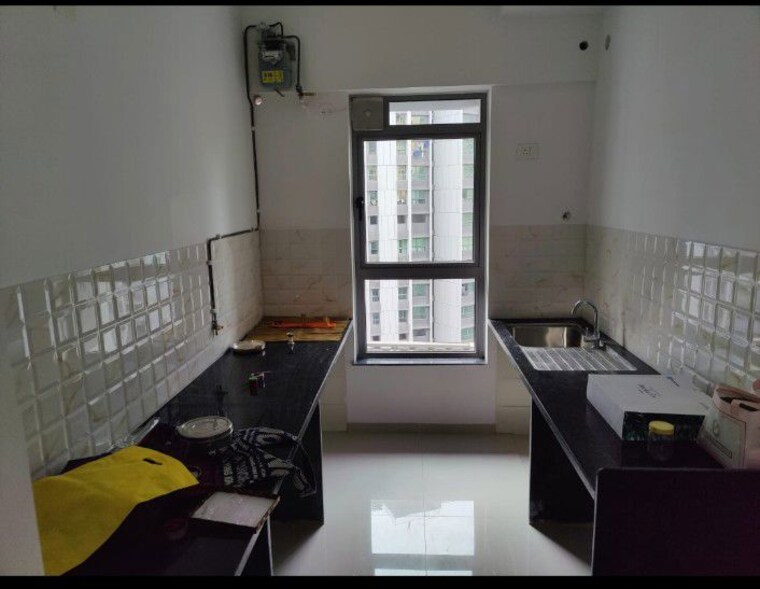 Kitchen, kalpataru-immensa-e 2 Bedroom 632 Sq.Ft. Apartment In Kolshet Road Thane 10614024