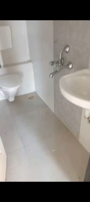 Bathroom in 2 BHK Apartment at Andheri Indira Nagar CHS, Andheri West – for Sale