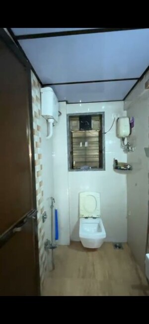 Bathroom in 1 BHK Apartment at RNA NG Suncity Phase II, Kandivali East – for Sale
