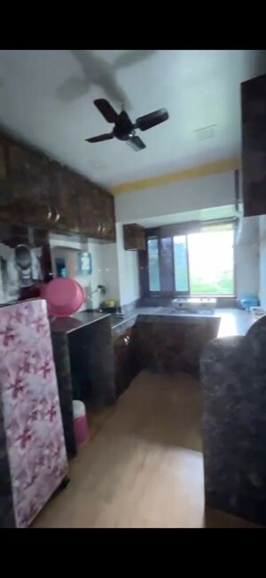 Kitchen in 1 BHK Apartment at RNA NG Suncity Phase II, Kandivali East – for Sale