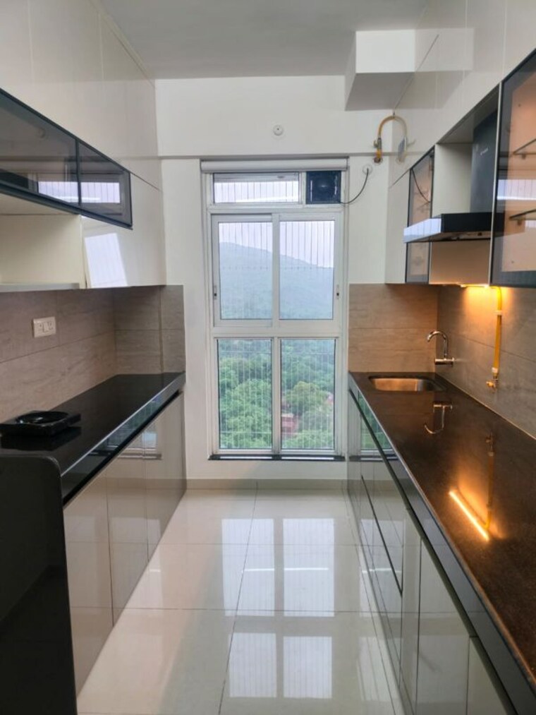 Kitchen, lodha-amara 2 Bedroom 712 Sq.Ft. Apartment In Kolshet Road Thane 10614110