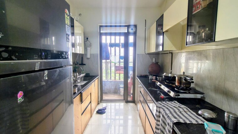 Kitchen, lodha-amara 2 Bedroom 712 Sq.Ft. Apartment In Kolshet Road Thane 10614110