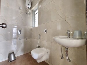 Bathroom in 1 BHK Apartment at Raunak Bliss, Ghodbunder Road – for Rent