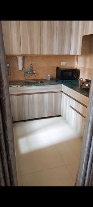 Kitchen in 2 BHK Apartment at Jaypee Greens Kosmos, Sector 134 – for Rent