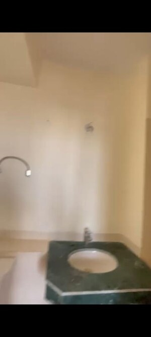 Bathroom in 1 RK Apartment at Jaypee Kensington Boulevard, Sector 131 – for Sale