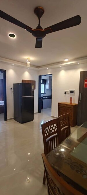 Living Room in 2 BHK Apartment at Dev Leo Tower, Oshiwara – for Rent