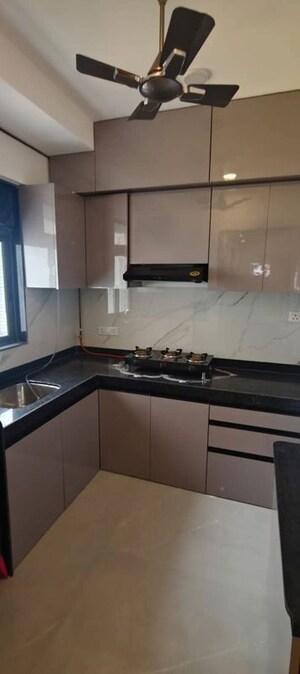 Kitchen in 2 BHK Apartment at Dev Leo Tower, Oshiwara – for Rent