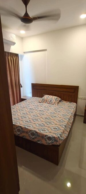 Bedroom in 2 BHK Apartment at Dev Leo Tower, Oshiwara – for Rent