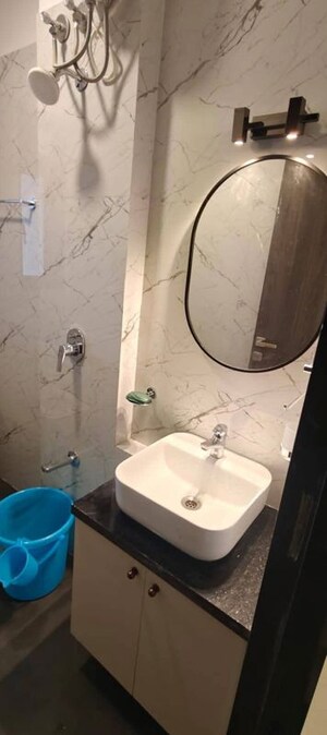 Bathroom in 2 BHK Apartment at Dev Leo Tower, Oshiwara – for Rent