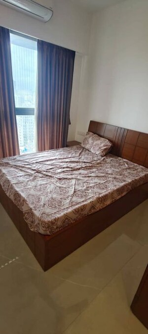 Bedroom in 2 BHK Apartment at Dev Leo Tower, Oshiwara – for Rent