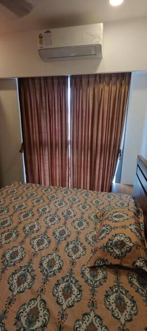 Bedroom in 2 BHK Apartment at Dev Leo Tower, Oshiwara – for Rent