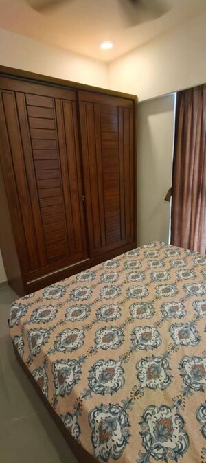 Bedroom in 2 BHK Apartment at Dev Leo Tower, Oshiwara – for Rent
