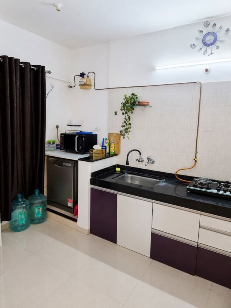 Kitchen, nyati-evara 1 Bedroom 900 Sq.Ft. Apartment In Kondhwa Pune 10574391