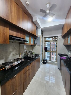 Kitchen in 2 BHK Apartment at Sheth Vasant Oasis, Andheri East – for Rent