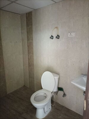 Bathroom in 3 BHK Apartment at SVP Gulmohur Garden, Raj Nagar Extension – for Sale