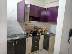 Kitchen in 3 BHK Apartment at SVP Gulmohur Garden, Raj Nagar Extension – for Sale
