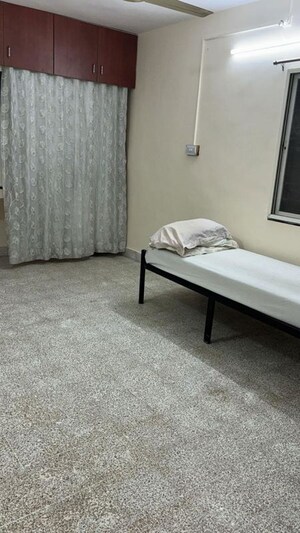 Bedroom in 2 BHK Apartment at Senapati Bapat Road – for Rent