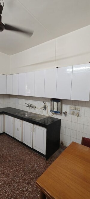 Kitchen in 2 BHK Apartment at Senapati Bapat Road – for Rent