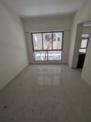 Living Room in 1 BHK Apartment at Reliance Swastik, Borivali West – for Rent