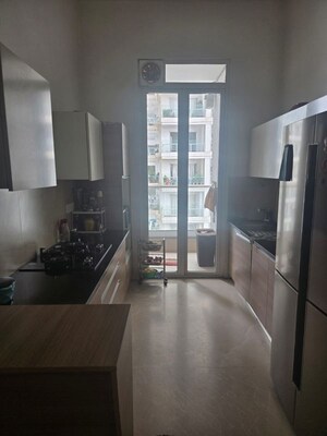 Kitchen in 3.5 BHK Apartment at Omkar Alta Monte, Malad East – for Rent