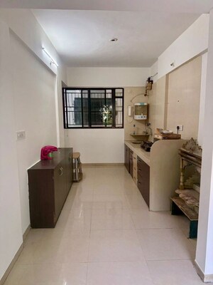 Kitchen in 2 BHK Apartment at Renuka Gulmohar C Building CHS, Pimpri – for Rent