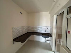 Kitchen in 2 BHK Apartment at Godrej Green Cove, Mahalunge – for Rent