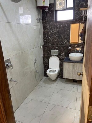 Bathroom in 3 BHK Apartment at Ridhiraj Sky, Vaishali Nagar – for Rent