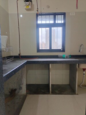 Kitchen in 1 BHK Apartment at Dosti Desire Joy, Brahmand – for Rent