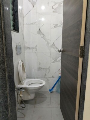 Bathroom in 1 BHK Apartment at Dosti Desire Joy, Brahmand – for Rent